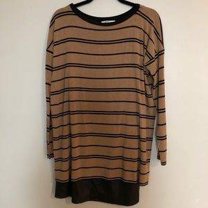 Tan and black faux leather trim dress.